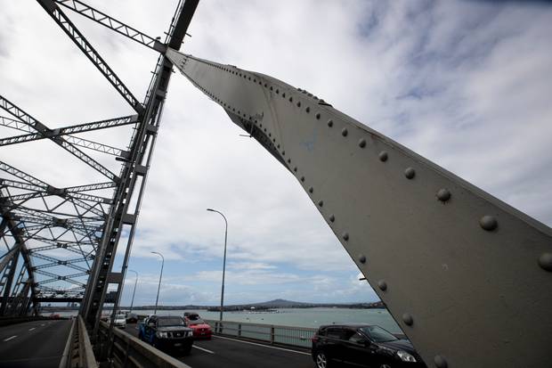The Auckland Harbour Bridge that had a centre span damaged after a truck crash when a powerful gust of wind tipped it over. Photo / Dean Purcell