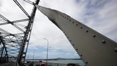 The Auckland Harbour Bridge that had a centre span damaged after a truck crash when a powerful gust of wind tipped it over. Photo / Dean Purcell
