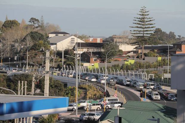 The scene on Royal Rd in Massey, West Auckland, where it was taking an hour to get to the on-ramp from nearby Don Buck Road. (Photo / Michael Craig)
