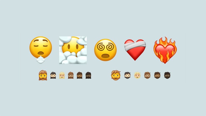 A sample of the new emojis coming in 2021 shows the bandaged heart, face in the clouds and bearded faces.