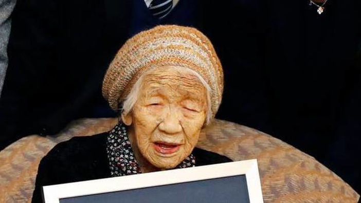 Kane Tanaka poses with her Guinness World Records certificate at a nursing home where she lives in Fukuoka. Photo / AP