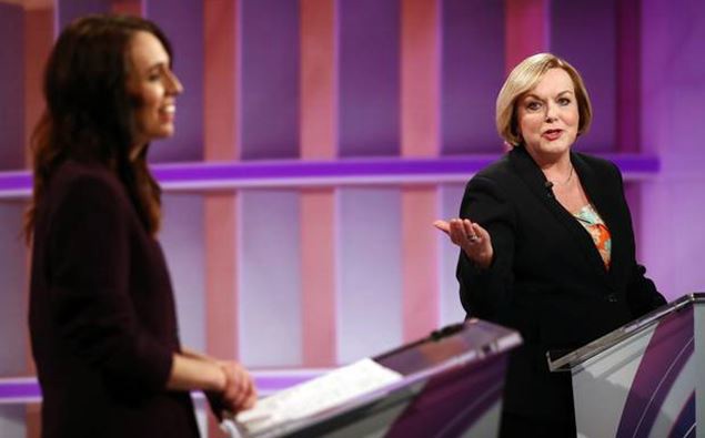 Judith Collins (R) and Jacinda Ardern (L) speak during the live leaders debate in Auckland. Photo / Getty Images