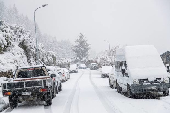 Queenstown residents woke up to a white blanket of snow. Photo / James Allan