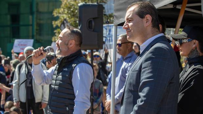 Advance NZ co-leaders Billy Te Kahika, left, and Jami-Lee Ross address the crowd at an anti-lockdown rally in Auckland this month. Photo / Peter Meecham