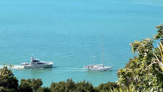 The 16-metre yacht Anita arriving in Opua on Friday afternoon escorted by New Zealand Customs patrol vessel Hawk V after the German crew arrived in the country unlawfully. Photo / Supplied