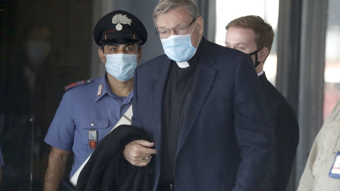 Australian Cardinal George Pell arrives at Rome's international airport in Fiumicino. (Photo / AP)