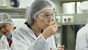 Prime Minister Jacinda Ardern tasting hemp protein ice cream during her visit to FoodPilot in Palmerston North. (Photo / NZ Herald)