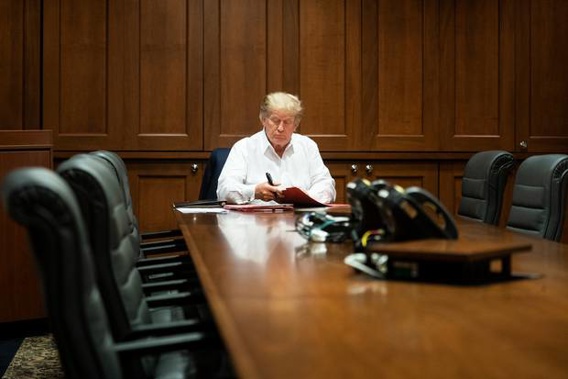 In a photo released to media, US President Donald Trump works in his conference room at Walter Reed National Military Medical Center. Photo / AP