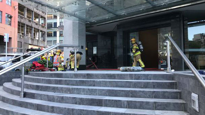 Fire and Emergency personnel at a 12-storey building on Fanshawe St, Auckland. Photo / Lane Nichols