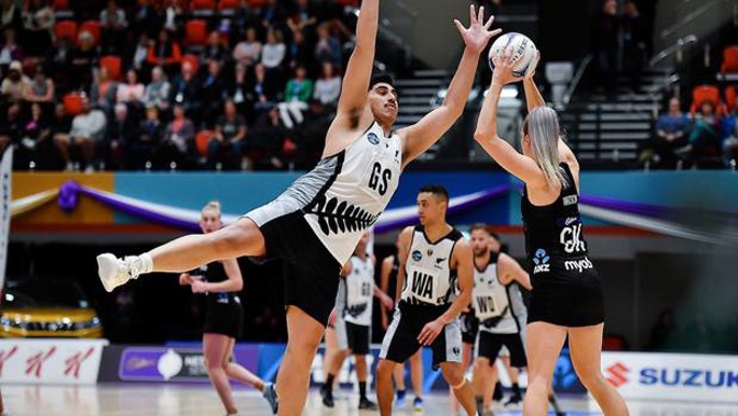 Junior Levi on defence against Jane Watson in the 2019 Cadbury Netball Series. (Photo / Photosport)