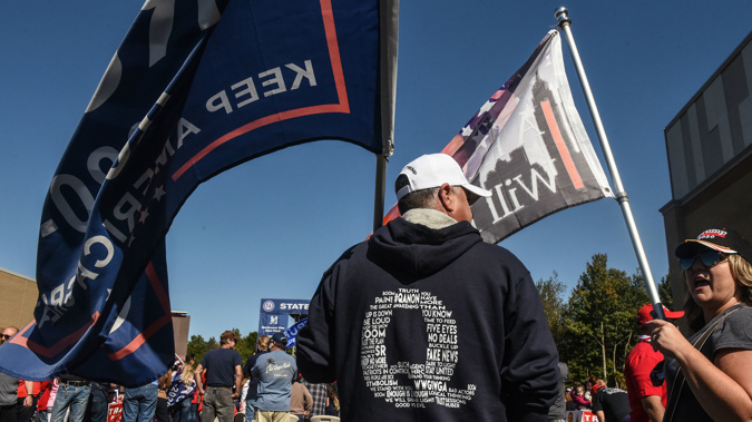A person wears a QAnon sweatshirt during a pro-Trump rally on October 3, 2020 in the borough of Staten Island in New York City. (Photo / Getty)