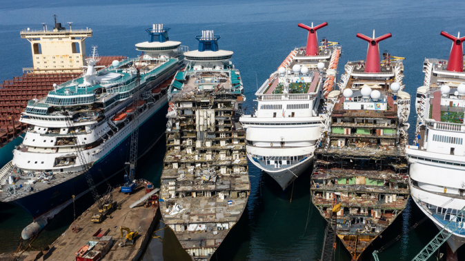 Cruise ships that once ferryed passengers on vacations around the world, now lie ready to be sold for scrap. (Photo / Getty)