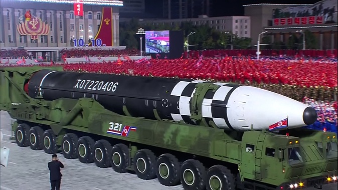 North Korea unveiled what analysts believe to be the world's largest liquid-fueled intercontinental ballistic missile at a parade in Pyongyang. (Photo / Korean Central TV)