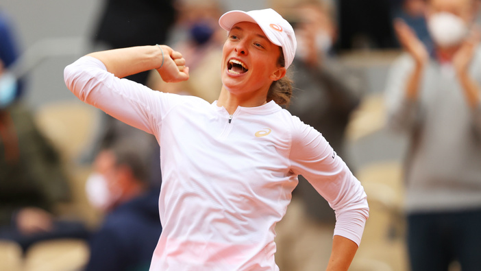 Iga Swiatek of Poland celebrates after winning the women's singles final at the French Open in Paris against Sofia Kenin of the United States.