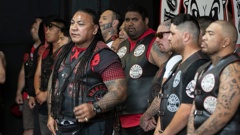 Sonny Fatupaito welcomes guests to the Waikato Mongrel Mob's headquarters in November last year. (Photo / Alan Gibson)