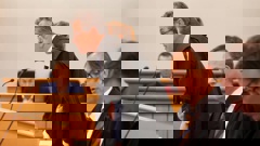 The sportsman's lawyer Michael Heron, QC (standing), says his client has nothing to do with importing or financing drugs. Photo / File