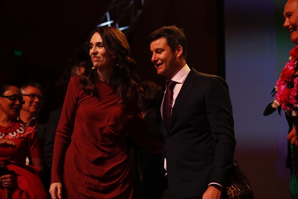 Labour leader and Prime Minister Jacinda Ardern celebrate with partner Clarke Gayford. (Photo / Supplied)