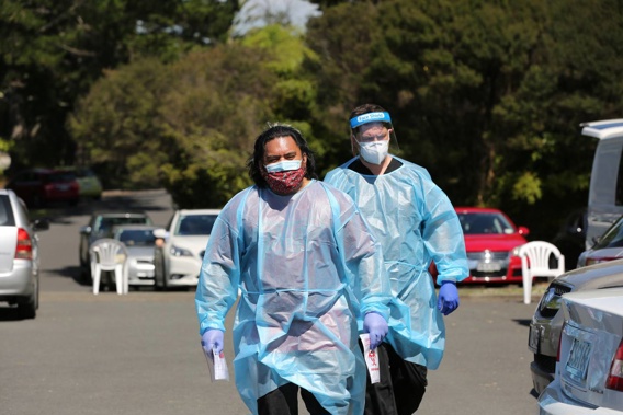 Staff at the Wainoni Park testing station in Greenhithe today. (Photo / Sylvie Whinray)
