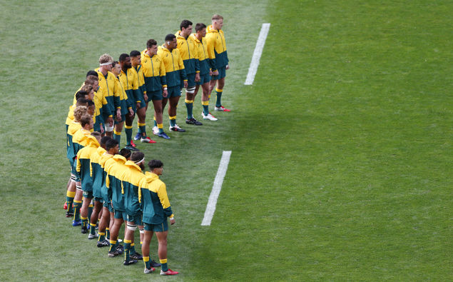 Wallabies players during the national anthem. (Photo / Getty)
