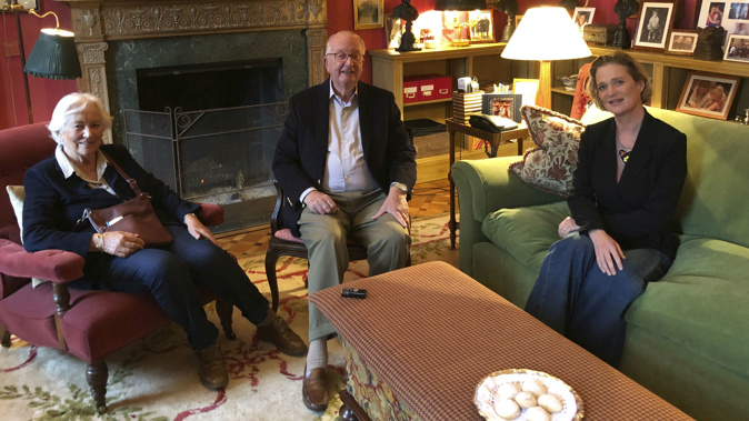 In this handout photo made available by the Belgium Royal palace on Tuesday, Oct. 27, 2020, Delphine Boel, right, now Belgium's Delphine de Saxe-Cobourg Gotha, meets her biological father King Albert II, center, and Queen Paola, left, during an informal meeting in Brussels.
