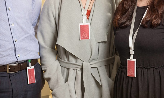 The Covid contact tracing card can be worn on a lanyard or clipped to the wearer's belt. Photo / Supplied