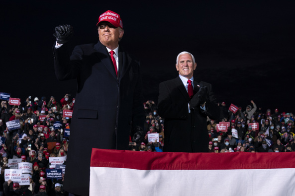 President Donald Trump and Vice President Mike Pence arrive for a campaign rally at Cherry Capital Airport in Traverse City. Photo / AP