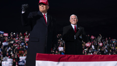 President Donald Trump and Vice President Mike Pence arrive for a campaign rally at Cherry Capital Airport in Traverse City. Photo / AP