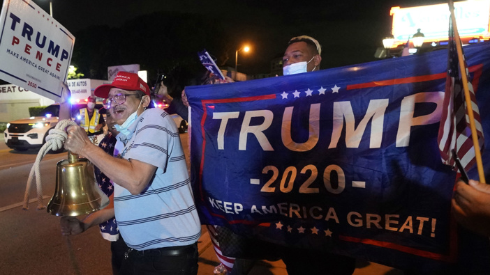 Trump supporters celebrate his victory in Florida. (Photo / AP)