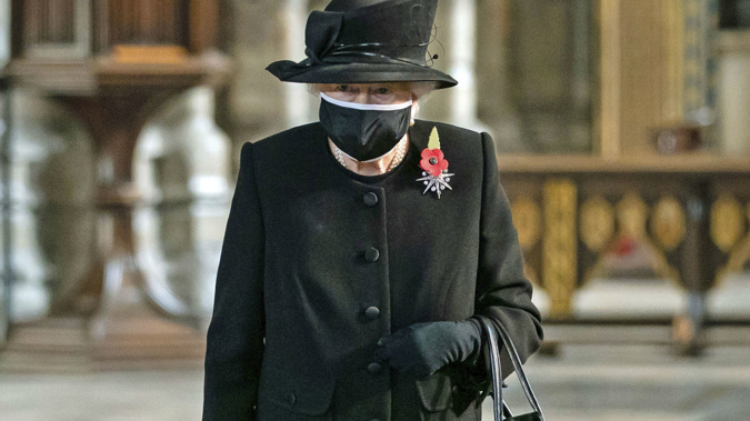 Queen Elizabeth II attends a ceremony to mark the centenary of the burial of the Unknown Warrior, in Westminster Abbey, London. (Photo / AP)