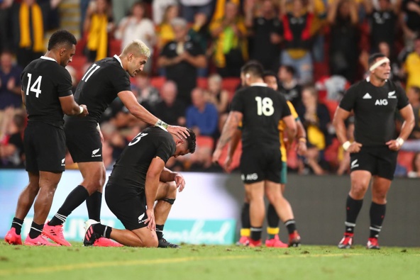 Anton Lienert-Brown is consoled by teammates Rieko Ioane and Sevu Reece after the final whistle at Suncorp Stadium at the weekend. Photo / Getty Images