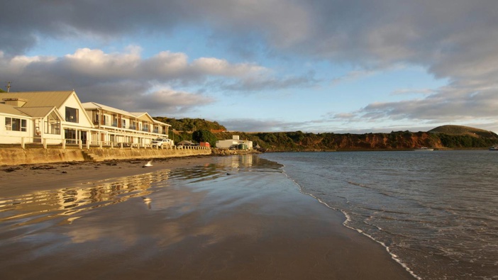 Hotel Chatham sits on the waterfront of Waitangi Bay on Chatham Island. Photo / Supplied