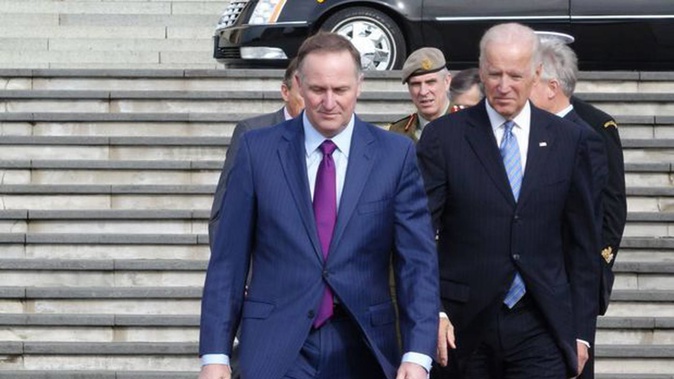 Former NZ Prime Minister Sir John Key and US President-elect Joe Biden Photo / RNZ