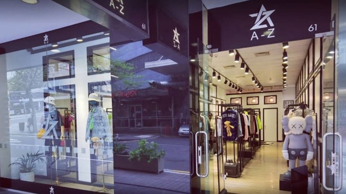 The infected woman worked at A-Z Collections in High St, Auckland.