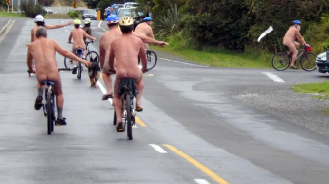 Southern Free Beaches members cycle in a pack as part of the World Naked Bike Ride in Waitati in March this year. Photo / Supplied