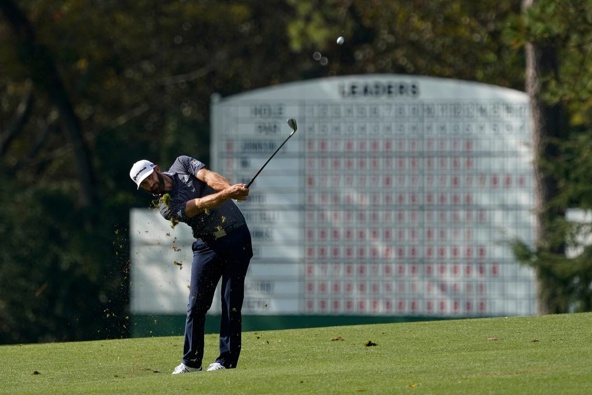 Dustin Johnson hits on the 14th fairway during the final round of the Masters. Photo / AP