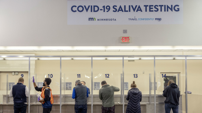 People get tested at the new saliva COVID-19 testing site at the Minneapolis-St. Paul International Airport.