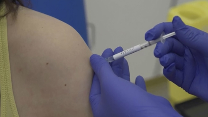 A key researcher at the University of Oxford says scientists expect to report results from the late-stage trials of their COVID-19 vaccine by Christmas