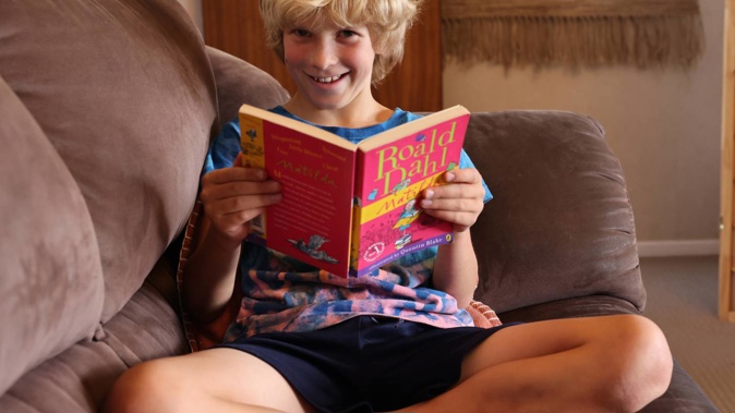 Hamish Firth, aged 9, isn't allowed any time on a computer except for piano lessons. Photo / Peter Meecham