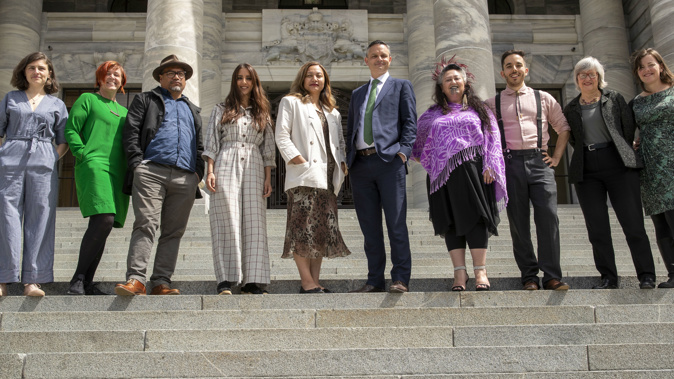 Green Party co-leaders Marama Davidson and James Shaw with their caucus on Parliament Steps. (Photo / NZ Herald)