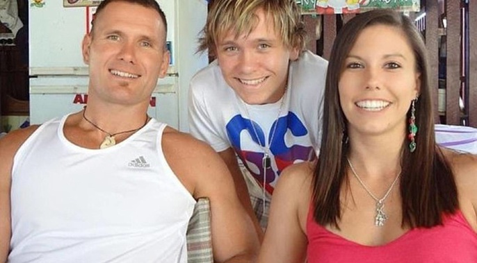 Isaiah Baxter (centre), the son of killer dad Rowan Baxter, who killed his wife Hannah Clarke (right) and three young children is suing her parents for a share of their daughter's $3.6 million estate.