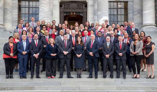 Prime Minister Jacinda Ardern and the Labour caucus on Parliament Steps for their official photograph. Photo / Mark Mitchell