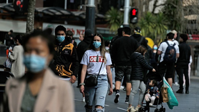 Aucklanders have been required to wear masks on public transport for the past week. Photo / Alex Burton