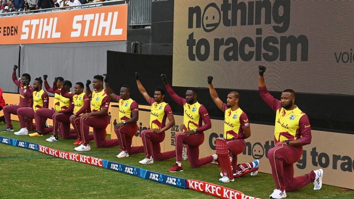 The West Indies team kneel in support of Black Lives Matter at Eden Park. Photo / Photosport