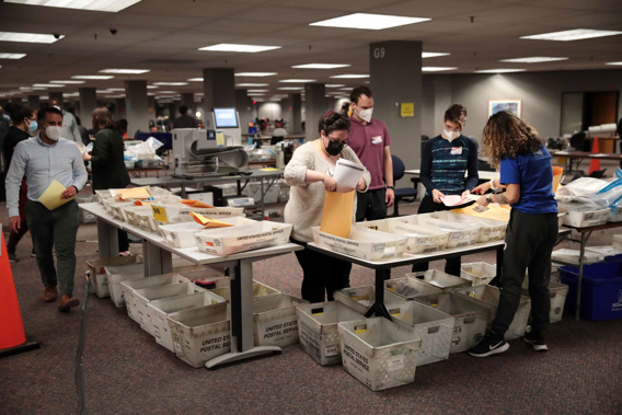 Election officials count absentee ballots on November 4, 2020, in Milwaukee, Wisconsin.