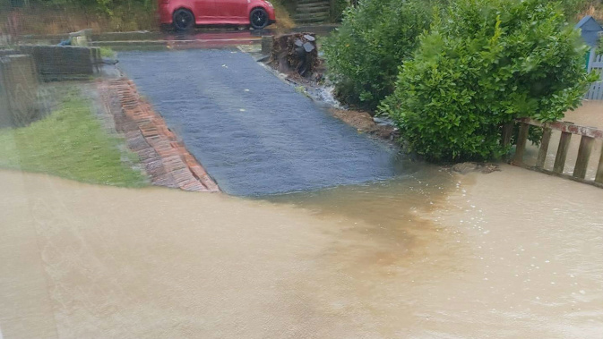 Hazel Kale's driveway flooded in the heavy rain. Photo / Supplied