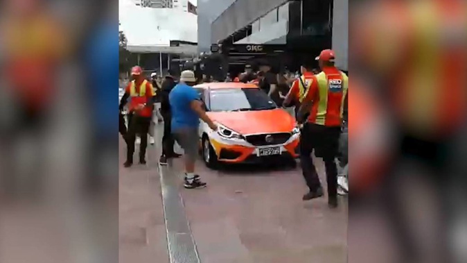 The crowd turned ugly after realising fake money was used in the promotion.
