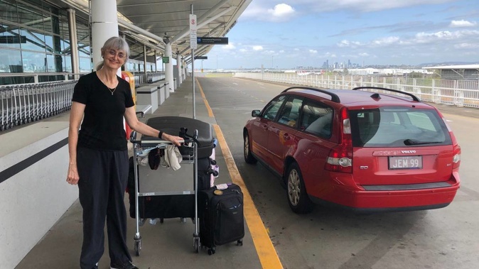 Dr Deborah Mills pictured at Brisbane Airport earlier this month just minutes before being told she won't be allowed back into New Zealand for Christmas.