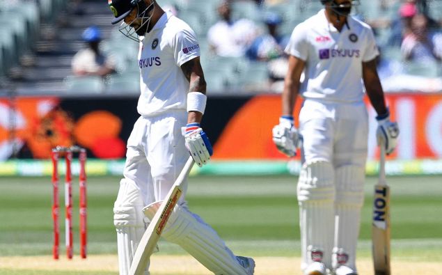 India's Virat Kohli departs as part of their lowest test score. Photo / AP