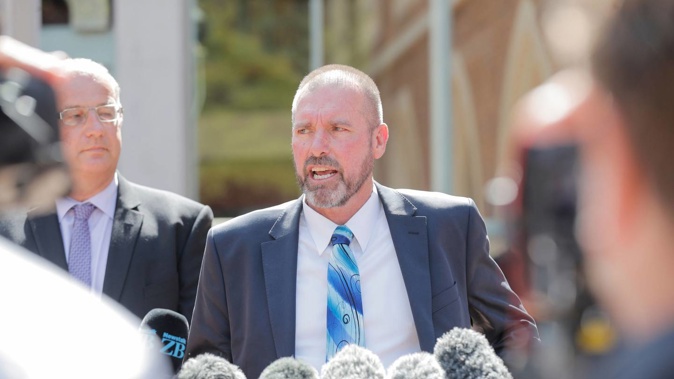 Detective Inspector Scott Beard outside the High Court at Auckland speaking to media about the Millane case. Photo / Dean Purcell
