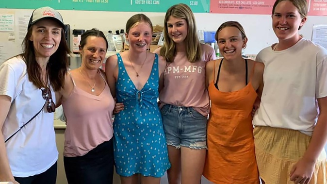 Prime Minister Jacinda Ardern with the staff at All Things Organic in Tairua, Gina Easton, Emily Ryan, Xanthe Cottier-Hall, Natasha Woolley, Zoe Bourne. Photo / Supplied